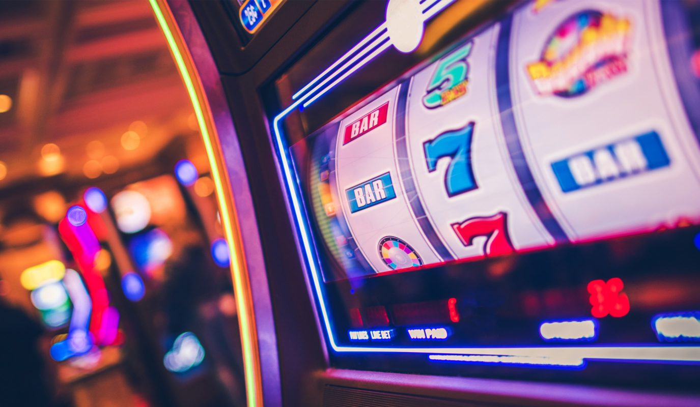 a photo of a slot machine with reels spinning